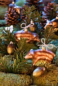 Christmas tree decorations shaped like wild boar and acorns