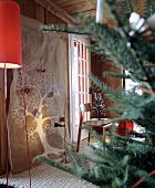 Linen cloth hand-painted with tree as wall hanging in festive room
