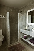 Brutalist bathroom - concrete shower partition and washstand