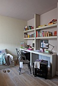 Corner of teenager's bedroom - classic metal chair at desk and minimalist wall-mounted shelving