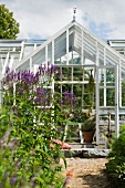 Greenhouse in flower garden