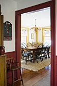 View through doorway colonial style dining room