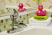 Pink Rubber Duck Next to Sink