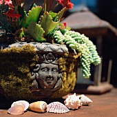 Centerpiece with carved face