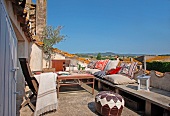 Sunny day in a comfortable seating area on a Mediterranean roof terrace