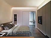 Bed in modern apartment style home