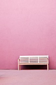 Bench in Front of Pink Wall