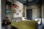 Lime green bed cover and floral artwork displayed in Moroccan bedroom