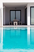 Minimalist ambiance with turquoise swimming pool