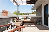 Roof terrace with pergola and comfortable seating