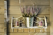 Flowers and candles decorating wooden house