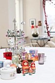 Christmas arrangement with Russian dolls on table