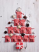 Christmas tree made from small numbered bags and chocolate truffles as baubles