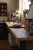 Rustic wooden kitchen counter with integrated sink