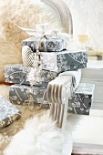 Wrapped presents stacked on fur-covered Rococo chair