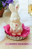 White chocolate Easter bunny on tissue paper in tartlet tin and Easter greeting on washi tape