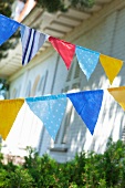 Colorful pennant in front of a house
