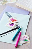 Pens, decorated envelopes & decorative postage stamps