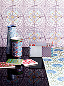 Strips of wallpaper in pastel shades, beakers, box and tiles