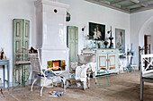 Vintage living room with wood-burning stove and antique furniture