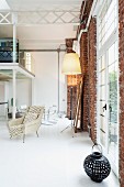Classic, designer loft apartment with gallery, steel girder structure and floor-to-ceiling windows in brick facade