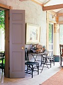 Screened in porch with garden style decor