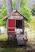 Homemade, rustic chicken coop with names