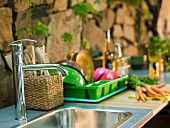 Kitchen sink at stone wall