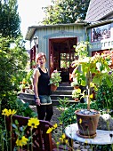 Woman in a garden, Sweden.