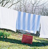 Bedclothes on a clothes line, Skane, Sweden.