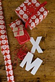 Christmas gift wrapped in red and white wrapping paper