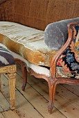 Wooden-framed Baroque-style bench with different fabrics on cushions and sides