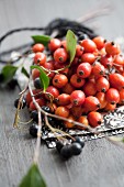 Rosehips and chokeberries on napkin