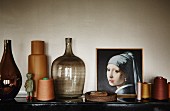 Ornaments; vintage vases, reels of thread, demijohn and oil painting