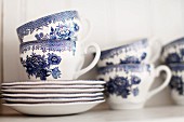 White tea service with blue painted pattern