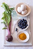 Natural dyes for dying Easter eggs - blueberries, turmeric and beetroot