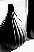 Pumpkin-shaped, black ceramic vase