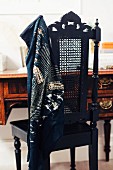 Scarf on antique, Wilhelmine-style chair painted black