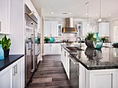 Marble kitchen island in contemporary house; Brea; California; USA