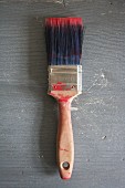 Flat paintbrush with paint residue