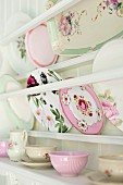 Decorative plates in white plate rack