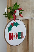 Fabric Christmas decoration in embroidery hoop