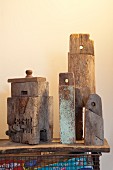 Still-life arrangement of rustic, vintage objects on wooden plank shelf