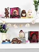 Various chocolate Easter treats on floating shelves