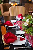 Christmas table with festive arrangement in dining room
