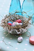 Painted ornamental eggs in Easter nest with crocheted doily