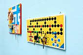 Key holder and pin board creatively crafted from board games