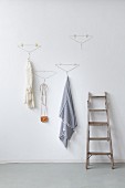 Improvised coat rack made from wire coat hangers