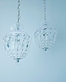 Crystal chandeliers hanging from chains