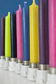 Colourful candles in candles made from old ceramic fuses